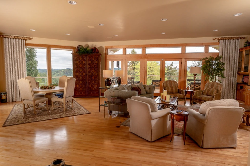 living room picture window with linen drapery panels